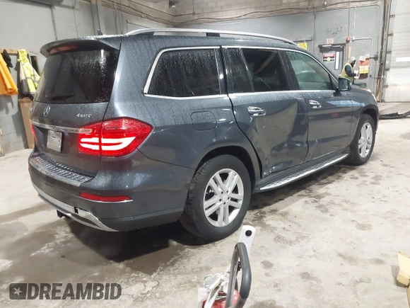 2013 Mercedes-Benz GL-Class GL 450 with VIN 4JGDF7CE1DA215608, listed as a IAAI auction lot 41924332 with 137,052 mi miles. Bid and sale history available at carsss.com. Image 4.