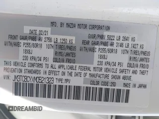 2021 Mazda CX-9 Touring z VIN JM3TCBCYXM0521323, wystawiony jako IAAI lot #42190976 z przebiegiem 56 652 mil mil oraz . Historia ofert i sprzedaży dostępna na DreamBid. Obrazek 9.