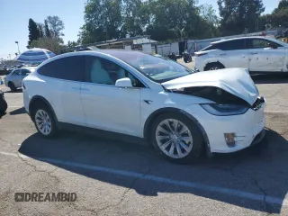 2020 Tesla Model X Long Range with VIN 5YJXCAE26LF270135, listed as a Copart auction lot 49711735 with Not Provided miles and Salvage Title. Bid and sale history available at carsss.com. Image 4.