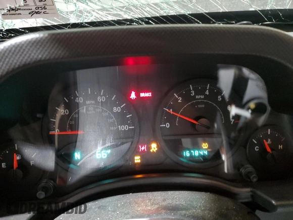 2008 Jeep Wrangler Unlimited X с VIN 1J4GA39128L632897, выставлен на аукционе Copart как лот 55282115 с пробегом 167 844 миль миль и Списание • Salvage title. История ставок и продаж доступна на DreamBid. Изображение 9.
