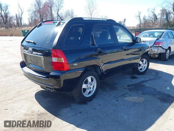 2007 Kia Sportage LX with VIN KNDJF724877313178, listed as a IAAI auction lot 41863492 with 199,138 mi miles. Bid and sale history available at carsss.com. Image 4.