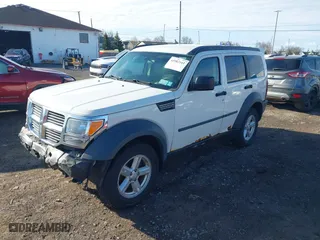 2007 Dodge Nitro SXT with VIN 1D8GU28K07W712036, listed as a IAAI auction lot 41982161 with 164,759 mi miles. Bid and sale history available at carsss.com. Image 17.