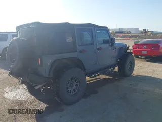 2015 Jeep Wrangler Unlimited Sport с VIN 1C4BJWDG6FL774275, выставлен на аукционе IAAI как лот 41984611 с пробегом 113 726 миль миль и . История ставок и продаж доступна на DreamBid. Изображение 4.