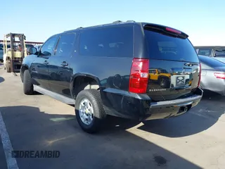 2012 Chevrolet Suburban LT with VIN 1GNSCJE00CR226285, listed as a IAAI auction lot 42059936 with 318,948 mi miles. Bid and sale history available at carsss.com. Image 3.