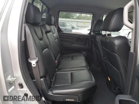2014 Honda Ridgeline Sport with VIN 5FPYK1F7XEB011983, listed as a Copart auction lot 64146835 with 121,345 mi miles and Salvage title. Bid and sale history available at DreamBid. Image 10.