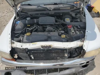 2004 Dodge Dakota SLT with VIN 1D7HL48K14S719751, listed as a Copart auction lot 64031654 with 288,226 mi miles and Salvage Title. Bid and sale history available at DreamBid. Image 12.