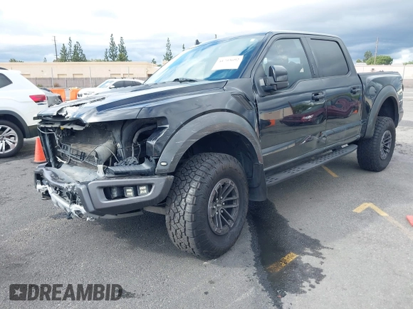 2020 Ford F-150 Raptor with VIN 1FTFW1RG2LFA30858, listed as a IAAI auction lot 41793692 with 90,018 mi miles and . Bid and sale history available at carsss.com. Image 2.