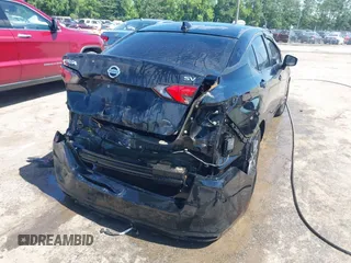 2021 Nissan Versa SV with VIN 3N1CN8EV2ML857305, listed as a IAAI auction lot 42504292 with 101,466 mi miles and . Bid and sale history available at DreamBid. Image 4.