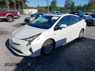 2017 Toyota Prius Two z VIN JTDKARFU1H3033538, wystawiony jako IAAI lot #42362770 z przebiegiem 74 671 mil mil oraz . Historia ofert i sprzedaży dostępna na DreamBid. Obrazek 17.
