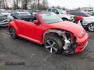2019 Volkswagen Beetle S with VIN 3VW5DAAT2KM508413, listed as a IAAI auction lot 41560137 with 52,781 mi miles and . Bid and sale history available at DreamBid. Image 1.