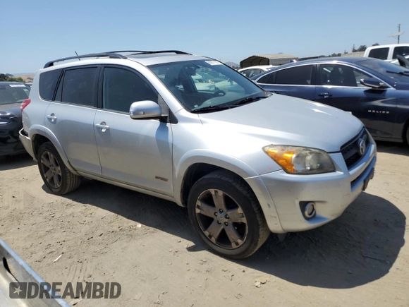 2010 Toyota RAV4 Sport with VIN JTMWF4DVXA5028981, listed as a Copart auction lot 60931165 with 214,075 mi miles and Salvage title. Bid and sale history available at DreamBid. Image 4.