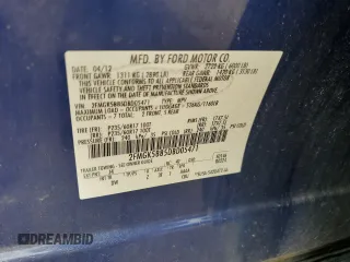 2013 Ford Flex SE z VIN 2FMGK5B85DBD05471, wystawiony jako Copart lot #56109575 z przebiegiem 161 792 mil mil oraz Szkoda całkowita • Salvage title. Historia ofert i sprzedaży dostępna na DreamBid. Obrazek 13.