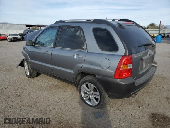 2005 Kia Sportage LX with VIN KNDJF723557124458, listed as a Copart auction lot 87089674 with Not Provided miles and Salvage Title. Bid and sale history available at carsss.com. Image 2.