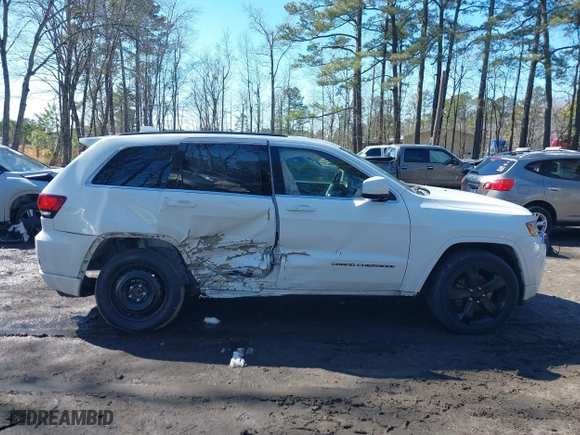 2015 Jeep Grand Cherokee Altitude with VIN 1C4RJFAG4FC924869, listed as a IAAI auction lot 41656444 with 112,786 mi miles. Bid and sale history available at carsss.com. Image 13.