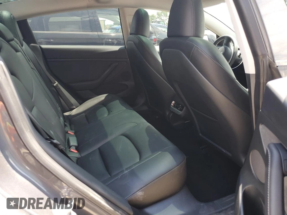 2023 Tesla Model 3 with VIN 5YJ3E1EA4PF614129, listed as a Copart auction lot 62019385 with 23,218 mi miles and Salvage title. Bid and sale history available at DreamBid. Image 10.