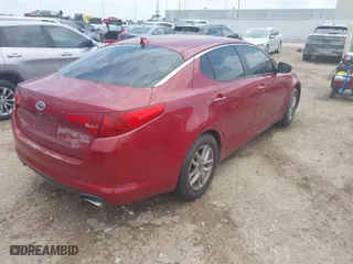 2011 Kia Optima LX with VIN KNAGM4A79B5057807, listed as a IAAI auction lot 42086984 with 133,261 mi miles. Bid and sale history available at carsss.com. Image 4.