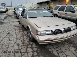 1995 Oldsmobile Cutlass Ciera SL z VIN 1G3AJ55MXS6369507, wystawiony jako Copart lot #82143844 z przebiegiem 95 303 mil mil oraz Szkoda całkowita • Salvage title. Historia ofert i sprzedaży dostępna na DreamBid. Obrazek 10.