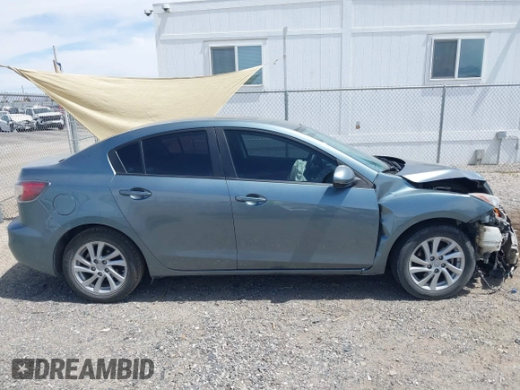 2012 Mazda Mazda3 i Touring with VIN JM1BL1V83C1625799, listed as a IAAI auction lot 42046912 with 227,680 mi miles. Bid and sale history available at carsss.com. Image 14.