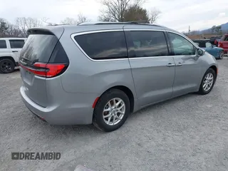 2021 Chrysler Pacifica Touring L with VIN 2C4RC1BG3MR542543, listed as a IAAI auction lot 41657073 with 118,833 mi miles and . Bid and sale history available at DreamBid. Image 4.