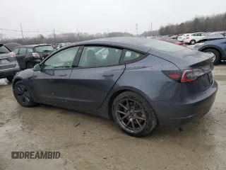 2021 Tesla Model 3 Standard Range Plus with VIN 5YJ3E1EA0MF907358, listed as a Copart auction lot 82103164 with 37,529 mi miles and Salvage Title. Bid and sale history available at DreamBid. Image 2.