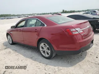 2015 Ford Taurus SEL z VIN 1FAHP2E88FG112446, wystawiony jako Copart lot #58920715 z przebiegiem 65 392 mil mil oraz Czysty tytuł • Clean title. Historia ofert i sprzedaży dostępna na DreamBid. Obrazek 2.