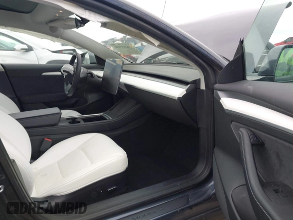 2022 Tesla Model 3 Long Range z VIN 5YJ3E1EB8NF315359, wystawiony jako IAAI lot #42035599 z przebiegiem 54 974 mil mil oraz . Historia ofert i sprzedaży dostępna na DreamBid. Obrazek 5.