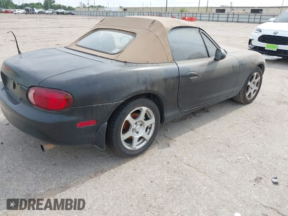 1999 Mazda MX-5 Miata with VIN JM1NB353XX0126008, listed as a IAAI auction lot 42435673 with 194,313 mi miles and . Bid and sale history available at DreamBid. Image 4.