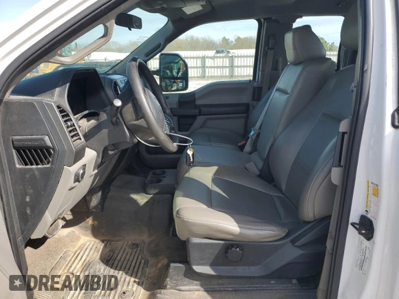 2019 Ford F-250 XL with VIN 1FT7X2B61KEG32082, listed as a Copart auction lot 49965105 with 104,658 mi miles and Salvage Title. Bid and sale history available at DreamBid. Image 7.