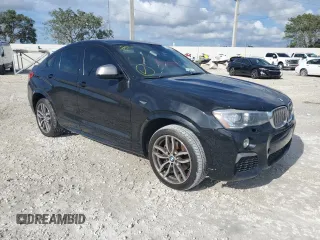 2017 BMW X4 M40i with VIN 5UXXW7C55H0U24877, listed as a Copart auction lot 71824502 with 0 mi miles. Bid and sale history available at carsss.com. Image 4.