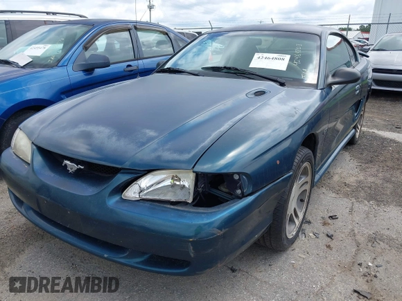 1996 Ford Mustang GT z VIN 1FALP42XXTF137304, wystawiony jako IAAI lot #42464808 z przebiegiem 166 565 mil mil oraz . Historia ofert i sprzedaży dostępna na DreamBid. Obrazek 6.