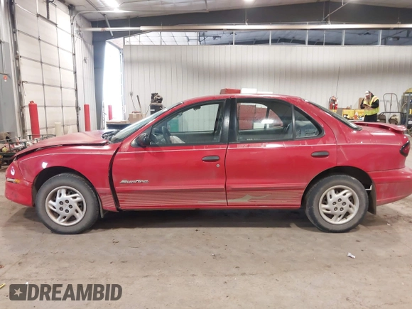 1999 Pontiac Sunfire SE z VIN 1G2JB524XX7547651, wystawiony jako IAAI lot #41962158 z przebiegiem 130 385 mil mil oraz . Historia ofert i sprzedaży dostępna na DreamBid. Obrazek 14.