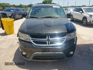 2013 Dodge Journey SXT with VIN 3C4PDCBGXDT557800, listed as a Copart auction lot 64415275 with 179,157 mi miles and Clean title. Bid and sale history available at DreamBid. Image 5.
