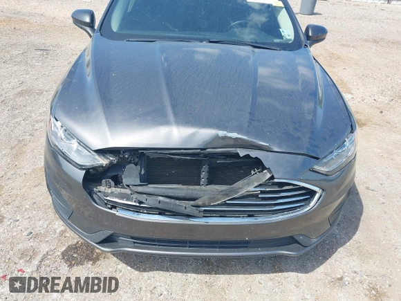 2020 Ford Fusion SE z VIN 3FA6P0H79LR118534, wystawiony jako IAAI lot #42065215 z przebiegiem 104 202 mil mil oraz . Historia ofert i sprzedaży dostępna na DreamBid. Obrazek 6.