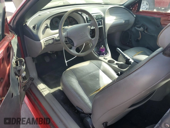 2002 Ford Mustang Deluxe with VIN 1FAFP44462F174929, listed as a Copart auction lot 61975925 with 110,825 mi miles and Salvage title. Bid and sale history available at DreamBid. Image 8.