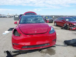 2023 Tesla Model Y Long Range with VIN 7SAYGDEE5PA198483, listed as a IAAI auction lot 41433952 with 24,753 mi miles and . Bid and sale history available at DreamBid. Image 13.