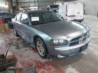2006 Dodge Charger with VIN 2B3KA43GX6H214702, listed as a IAAI auction lot 41883787 with 187,302 mi miles. Bid and sale history available at carsss.com. Image 1.