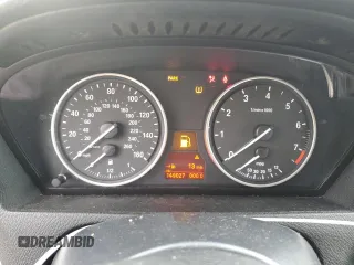 2012 BMW X5 35i z VIN 5UXZV4C5XCL748652, wystawiony jako Copart lot #55457455 z przebiegiem 149 030 mil mil oraz Szkoda całkowita • Salvage title. Historia ofert i sprzedaży dostępna na DreamBid. Obrazek 9.