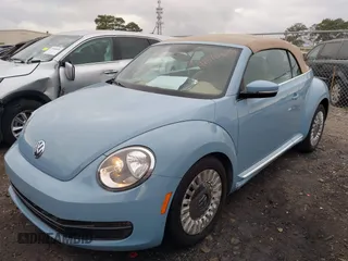 2015 Volkswagen Beetle 1.8T w/Tech with VIN 3VW517AT9FM802294, listed as a IAAI auction lot 41516005 with 110,184 mi miles and . Bid and sale history available at DreamBid. Image 17.