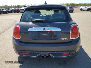 2014 MINI Hardtop S with VIN WMWXM7C54ET985344, listed as a Copart auction lot 55242945 with 87,017 mi miles and Salvage Title. Bid and sale history available at DreamBid. Image 6.