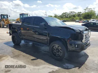 2019 GMC Canyon 2WD SLE with VIN 1GTG5CEN8K1101757, listed as a Copart auction lot 61854635 with 144,429 mi miles and Non repairable. Bid and sale history available at DreamBid. Image 4.