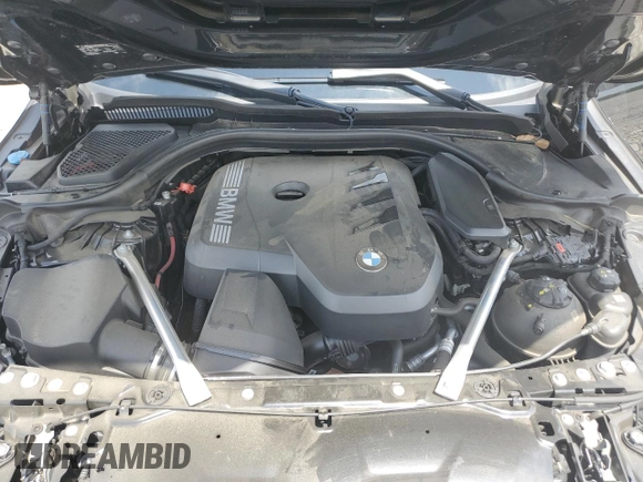 2024 BMW 5 Series 530i with VIN WBA43FJ09RCR05243, listed as a Copart auction lot 61690705 with 34,450 mi miles and Salvage title. Bid and sale history available at DreamBid. Image 11.
