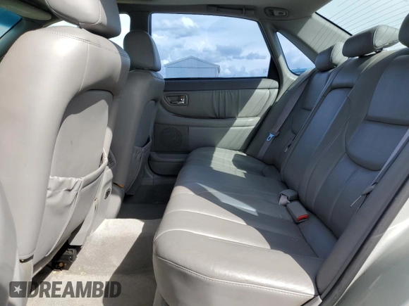 2000 Toyota Avalon XL with VIN 4T1BF28B3YU002835, listed as a Copart auction lot 50902115 with 128,699 mi miles and Salvage Title. Bid and sale history available at DreamBid. Image 10.