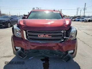2019 GMC Yukon SLE with VIN 1GKS1AKC9KR355643, listed as a Copart auction lot 52050855 with 50,729 mi miles and Salvage Title. Bid and sale history available at carsss.com. Image 5.