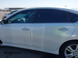 2014 Nissan Altima SL z VIN 1N4BL3AP9EC173704, wystawiony jako IAAI lot #42300470 z przebiegiem 139 036 mil mil oraz . Historia ofert i sprzedaży dostępna na DreamBid. Obrazek 14.