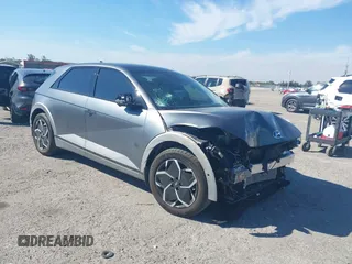 2024 Hyundai Ioniq 5 Limited z VIN KM8KR4DE2RU253057, wystawiony jako IAAI lot #41444014 z przebiegiem 6 185 mil mil oraz . Historia ofert i sprzedaży dostępna na DreamBid. Obrazek 1.