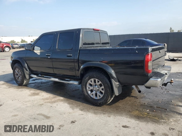 2000 Nissan Frontier XE with VIN 1N6ED27T7YC300373, listed as a Copart auction lot 55829535 with 301,305 mi miles and Salvage title. Bid and sale history available at DreamBid. Image 2.