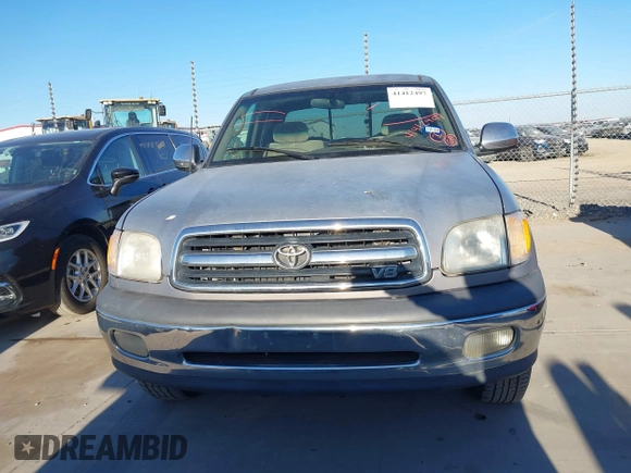 2000 Toyota Tundra SR5 with VIN 5TBRT3413YS019873, listed as a IAAI auction lot 41412497 with 305,472 mi miles and . Bid and sale history available at DreamBid. Image 12.