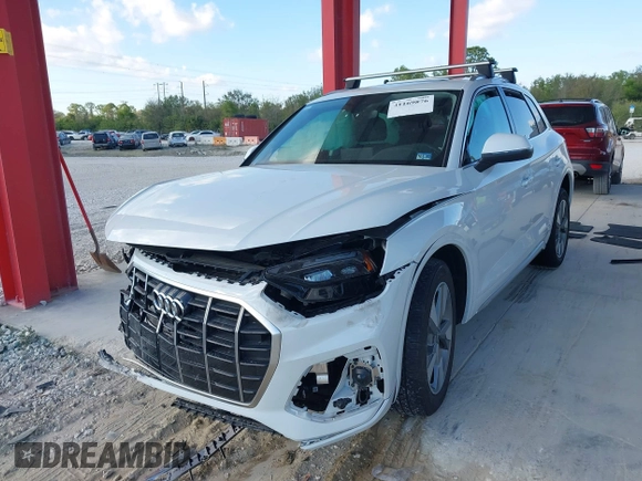 2023 Audi Q5 Premium Plus with VIN WA1BBAFY7P2024214, listed as a IAAI auction lot 41169876 with 21,183 mi miles and . Bid and sale history available at DreamBid. Image 2.
