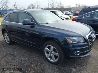 2011 Audi Q5 3.2L Premium Plus with VIN WA1DKAFP0BA080154, listed as a IAAI auction lot 41768990 with 123,297 mi miles. Bid and sale history available at carsss.com. Image 1.