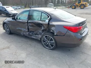 2014 Infiniti Q50 Premium z VIN JN1BV7AR0EM687810, wystawiony jako IAAI lot #42073610 z przebiegiem 167 912 mil mil oraz . Historia ofert i sprzedaży dostępna na DreamBid. Obrazek 3.
